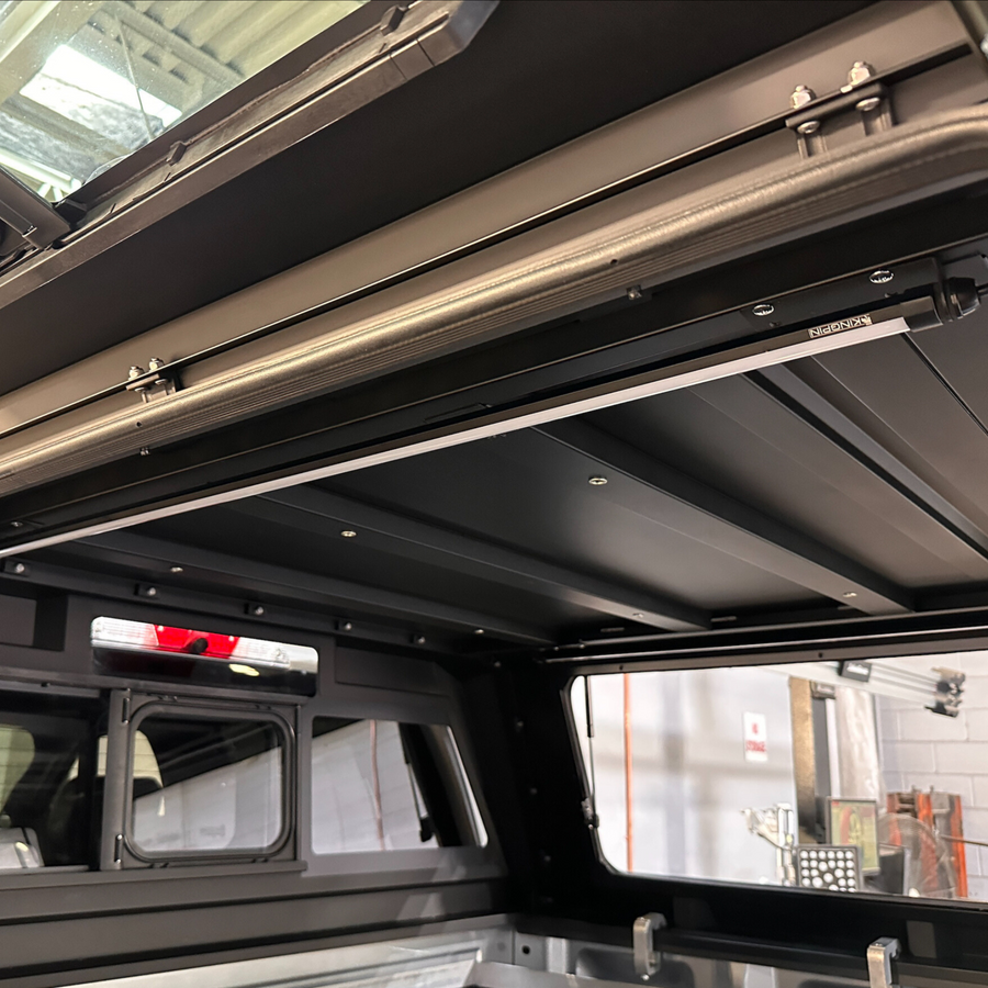 Kingpin light on the ceiling of a truck cap