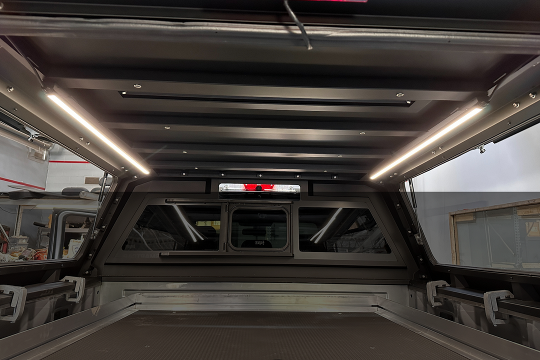 Kingpin v-series 40" light bars in RSI Smartcap bright illuminated interior truck canopy. 