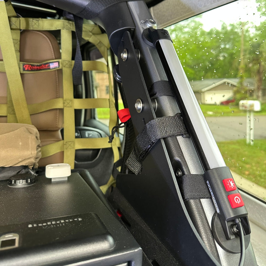 Kingpin F-Series 12" light mounted inside an SUV's rear door frame