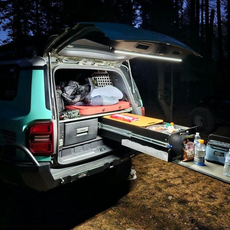 SUV rear drawers at camp lit by a Kingpin F-Series light