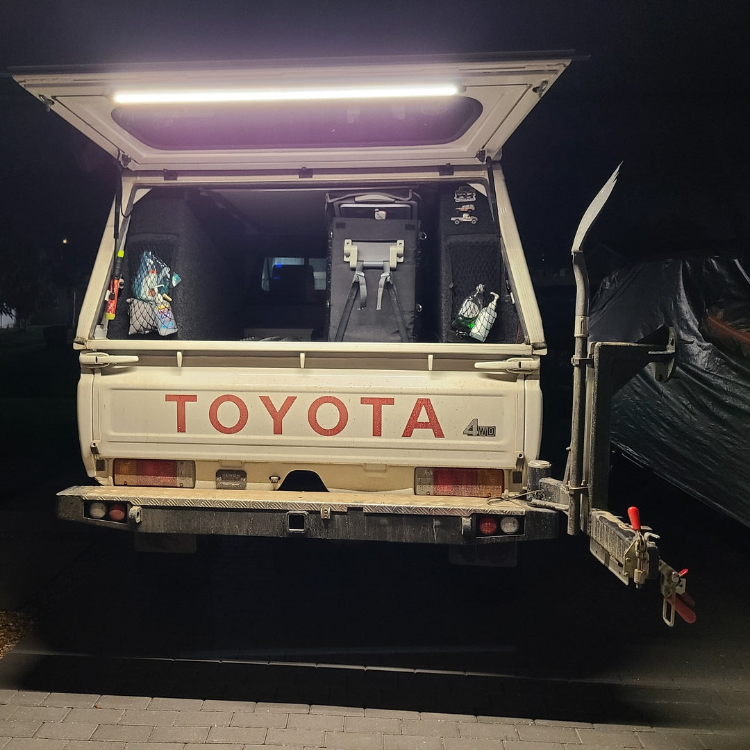 classic toyota landcruiser with kingpin light on rear hatch 