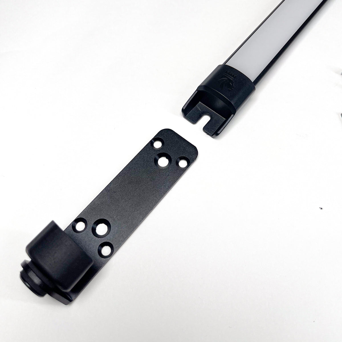 Kingpin Search Mount bracket next to the end of an F-Series light