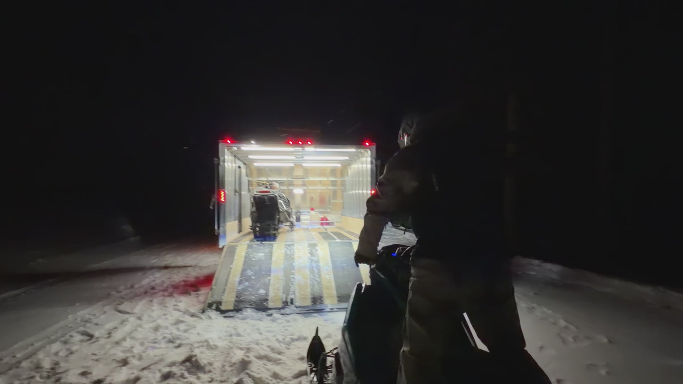 Enclosed trailer at night lit by Kingpin F-Series lights