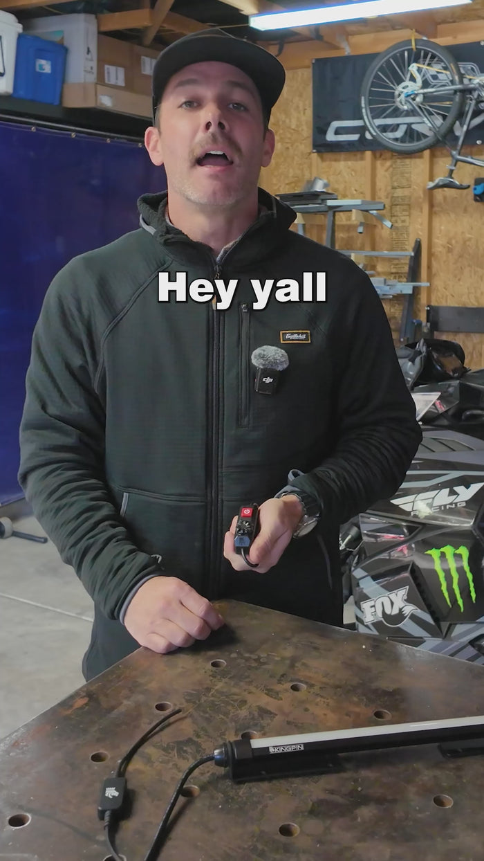 Kingpin team member talking about the Rotary Dimmer Switch in a shop