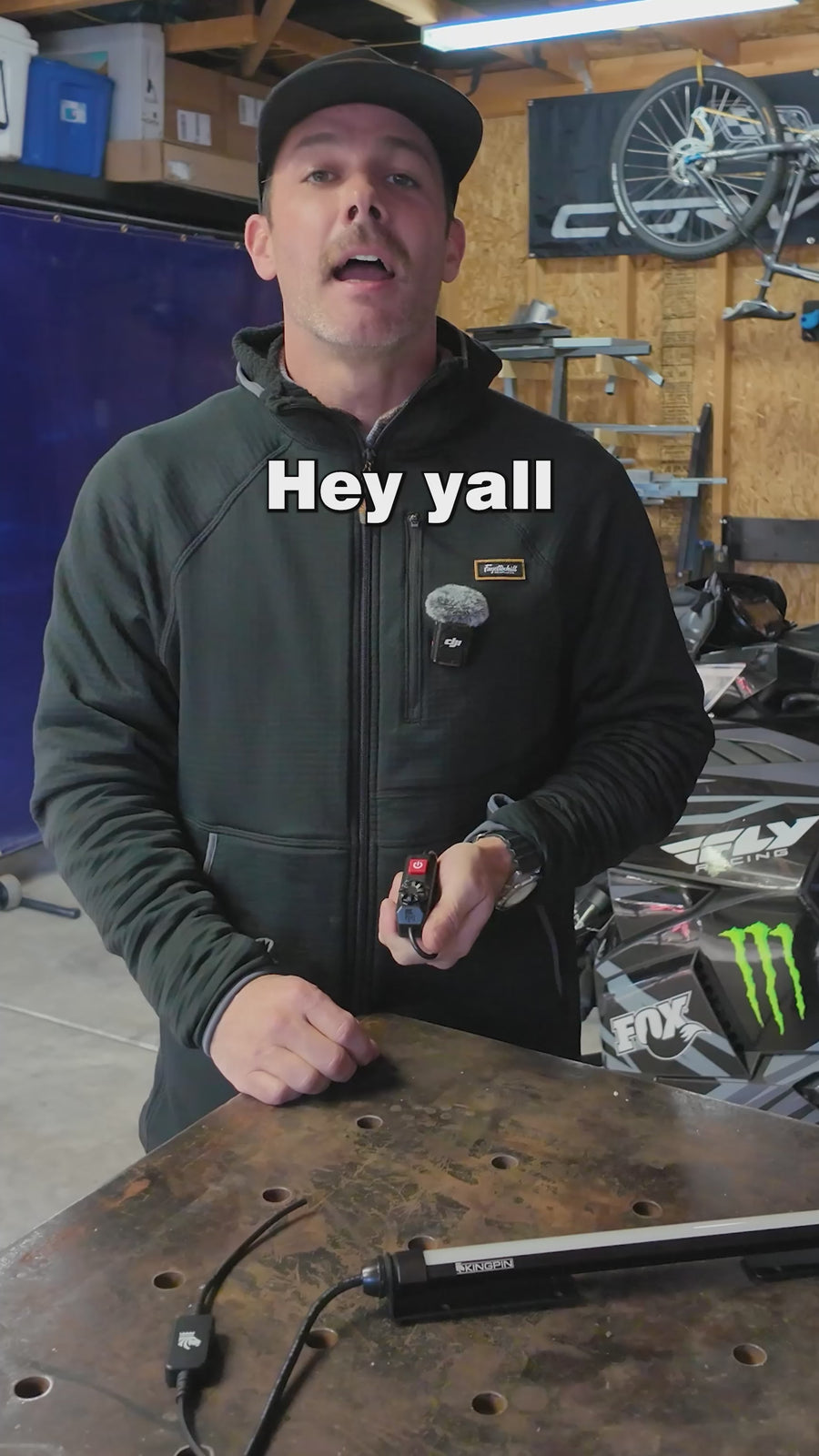 Kingpin team member talking about the Rotary Dimmer Switch in a shop